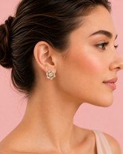 Fancy Stylish White Stone Gold Studs / Partywear Flower Earrings for Women