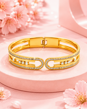Trendy Fancy Gold-Plated Moving Charm Kada / Stylish Partywear AD Bracelet for Women