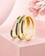 Designer Dual-Tone Leaf & Sunburst Bangle Set (4 Pcs)